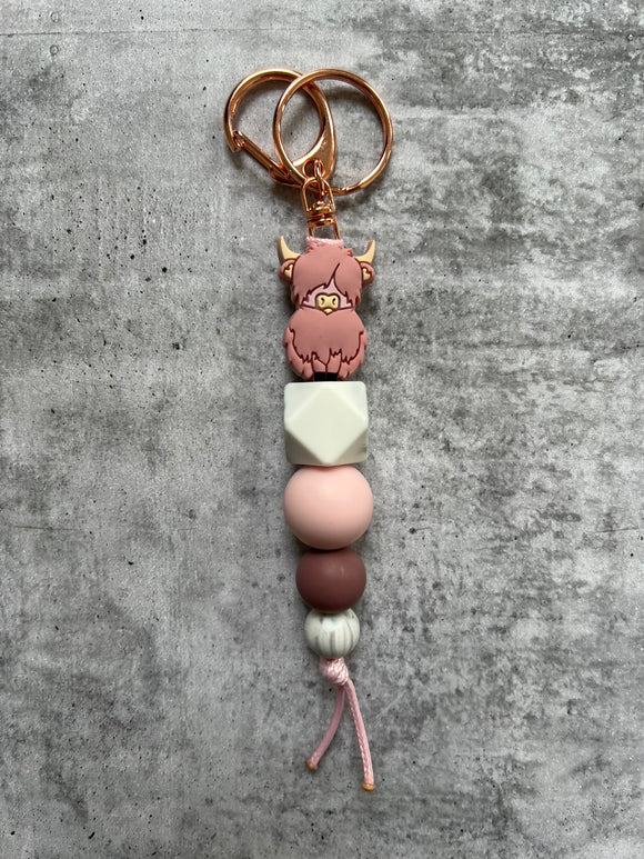 Dusty Rose Highland Cow Keyring - Main Image
